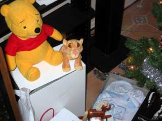 Pooh and Simba guard the gifts